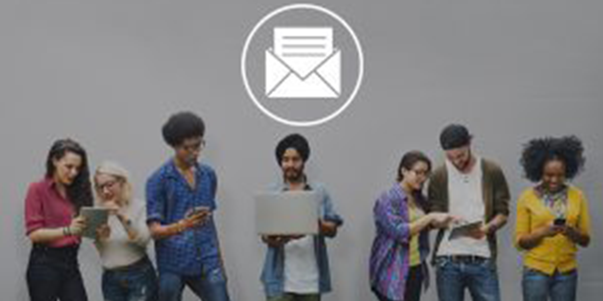 Group of people looking at digital devices